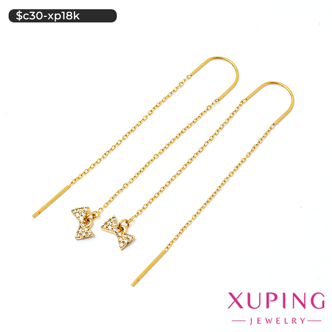 Aretes voladores de moño