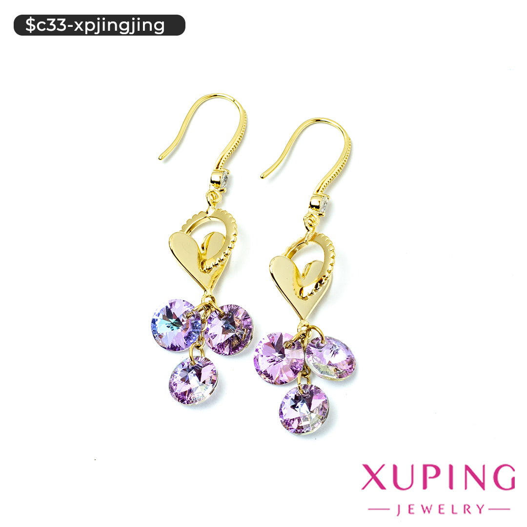 Aretes de corazón en 14K